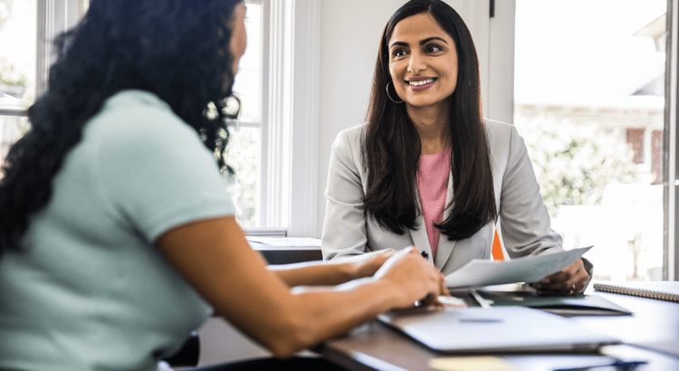 Real estate professional engaging with a client