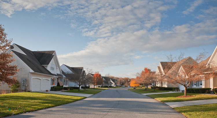 A row of houses or condos on a quiet street